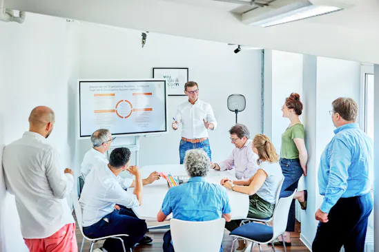 Andreas Jackel gives a presentation to his colleagues.